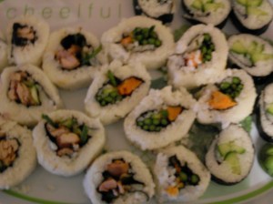 Cheelful sushi! Loose and kind of crappy-looking sushi rolls on my favourite platter ever.