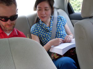 Grace and James navigate from the back seat, armed with a map of the region and an epic book of BC wineries.