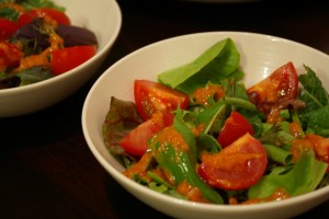 Grace's pretty salad. Fresh greens, and dressing she made herself: Roasted red peppers, garlic, olive oil, happy thoughts.