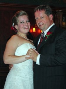 This is a picture of me and my dad. He's the one in black. I don't think he reads this. 