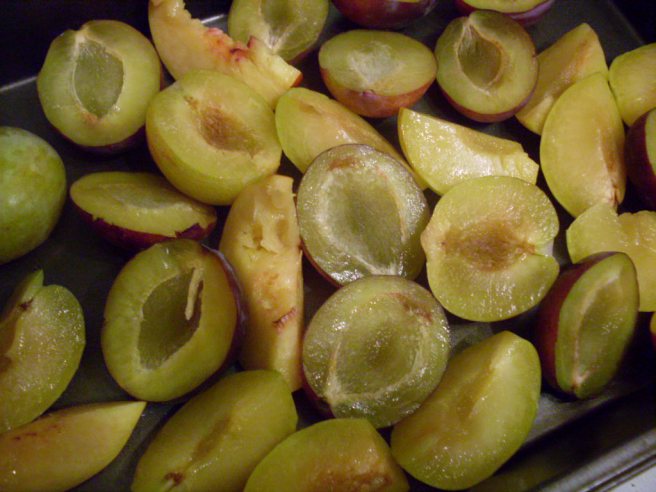 Plums, hacked up.