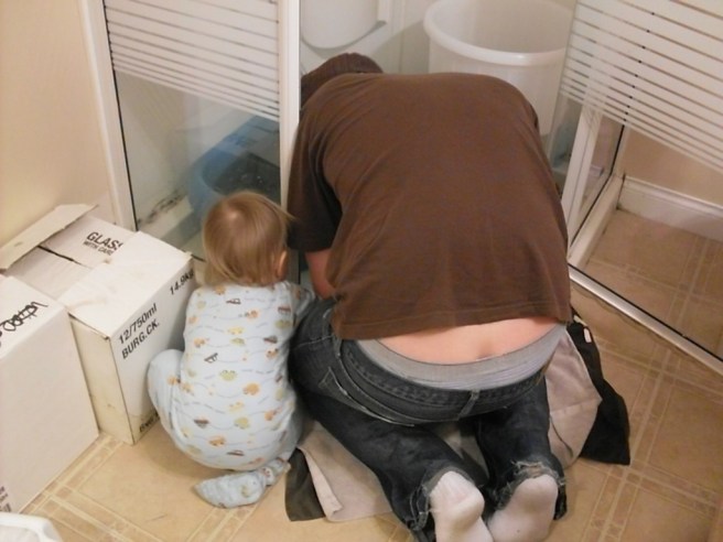 Nick and his little helper prep the bottles.
