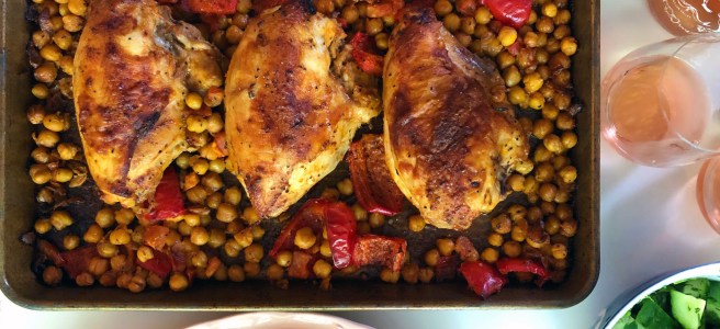 Sheet pan chicken with chickpeas and red peppers.